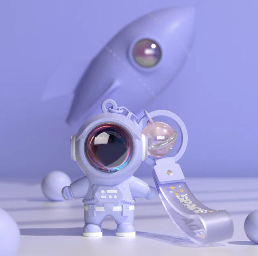 Astronaut keychain with flashlight purple