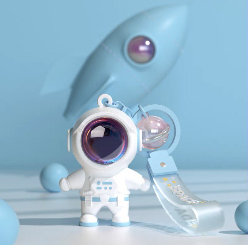 Astronaut keychain with flashlight blue