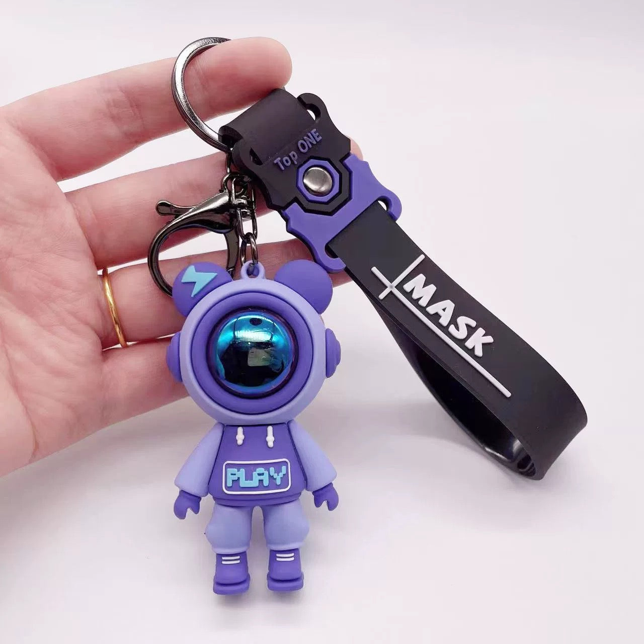 Keychain astronaut purple play