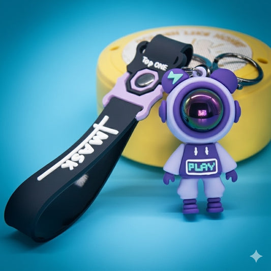 Keychain astronaut purple play