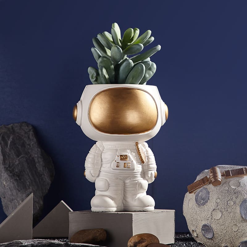 Astronaut figurine, plant pot