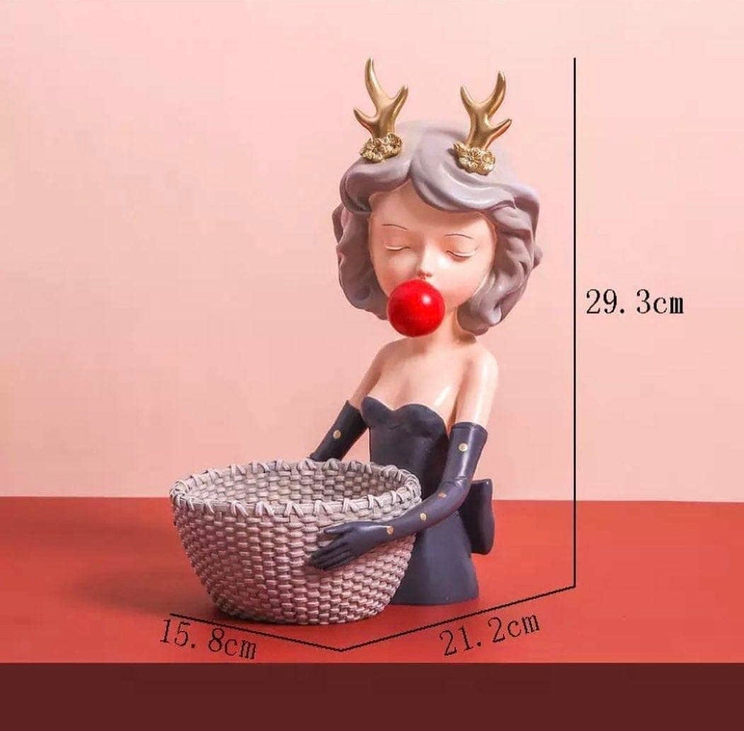 Figurine girl with a basket