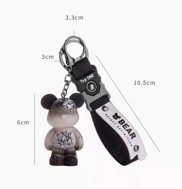 Broken bear keychain in black