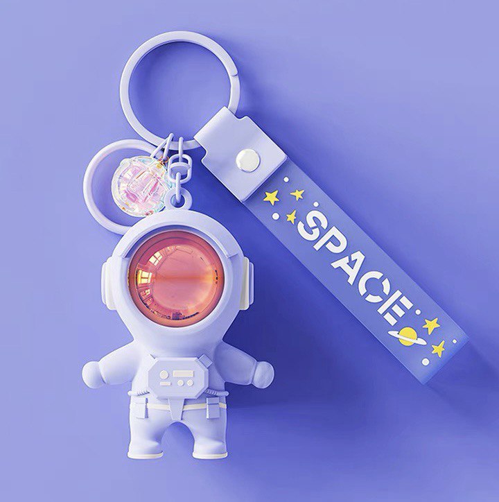 Astronaut keychain with flashlight purple