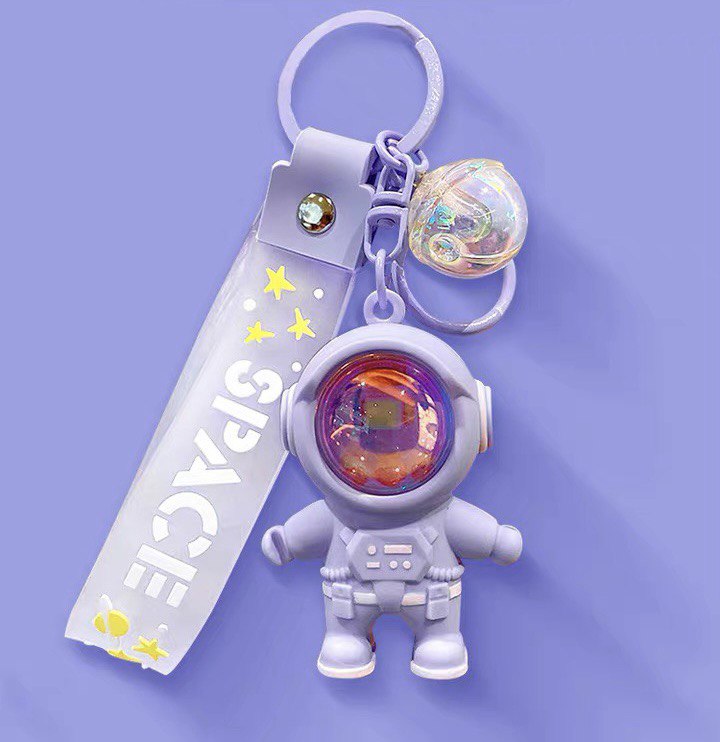 Astronaut keychain with flashlight purple