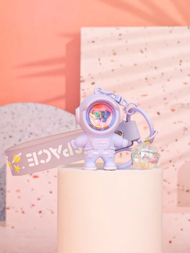 Astronaut keychain with flashlight purple