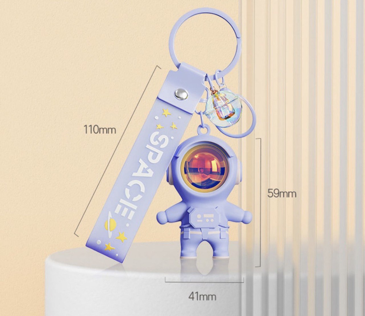 Astronaut keychain with flashlight purple