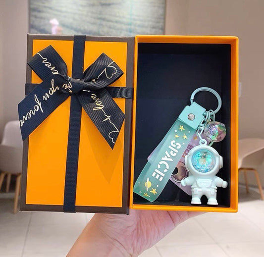 Astronaut keychain with flashlight green