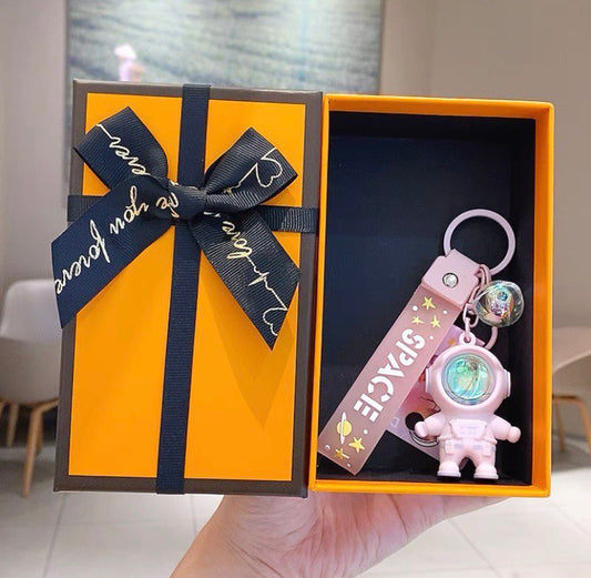 Astronaut keychain with flashlight pink