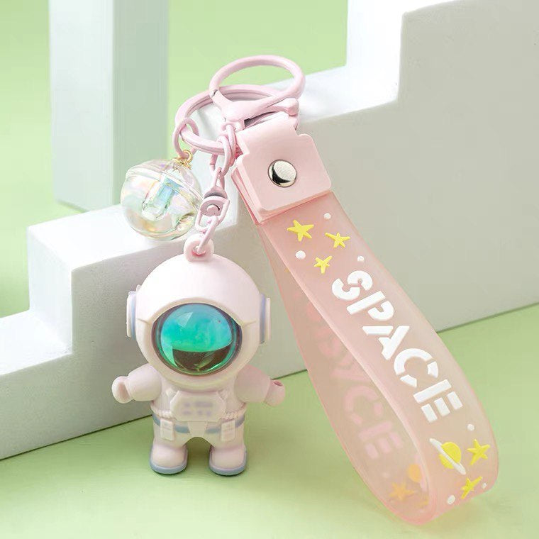 Astronaut keychain with flashlight pink