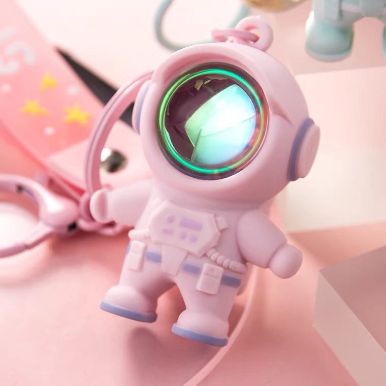 Astronaut keychain with flashlight pink