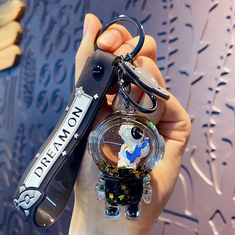 Keychain astronaut with guitar