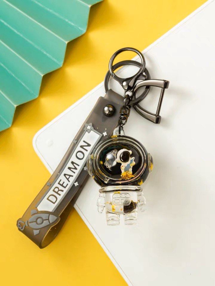 Keychain astronaut with guitar