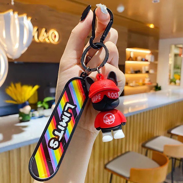 Keychain dog with skateboard red