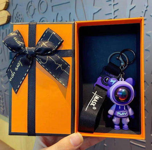 Keychain astronaut purple