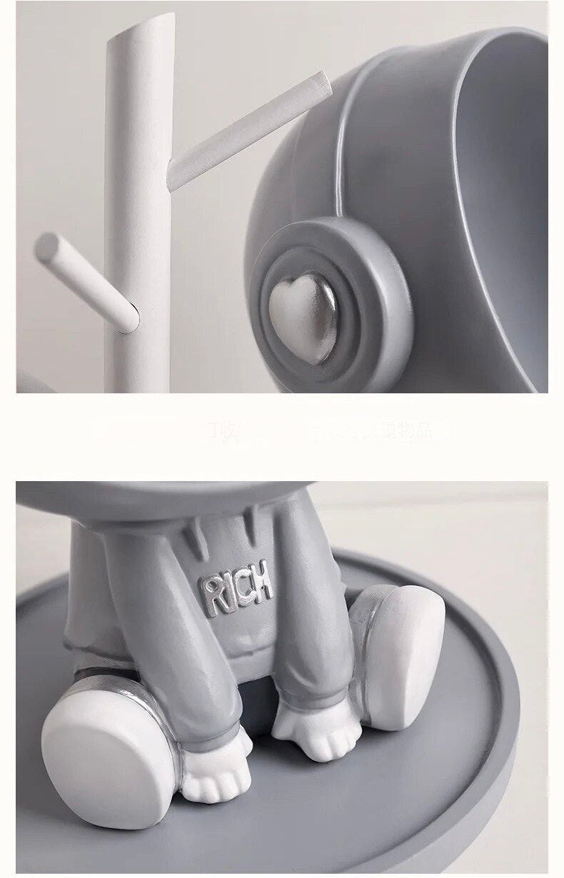 Astronaut figurine with a stand for small items, gray