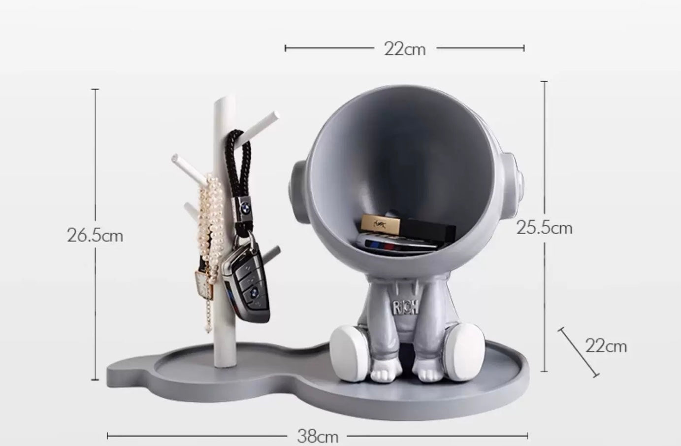 Astronaut figurine with a stand for small items, gray