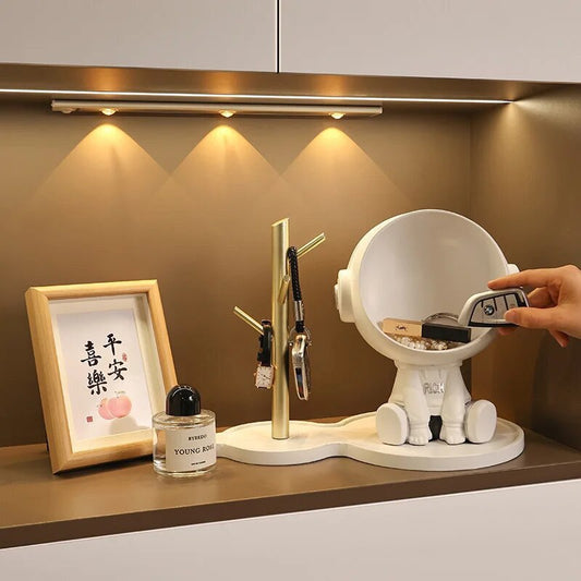 Astronaut figurine with a stand for small items, white