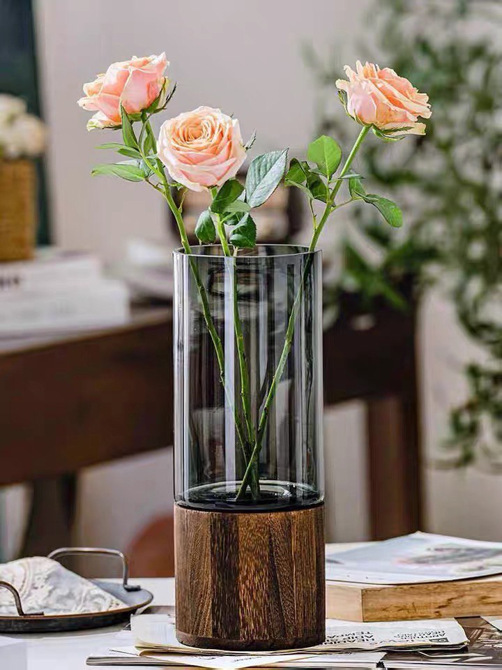 Glass vase with wooden base