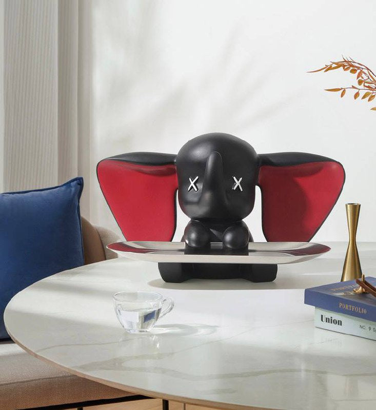 Black elephant figurine with tray