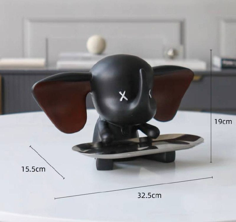 Black elephant figurine with tray