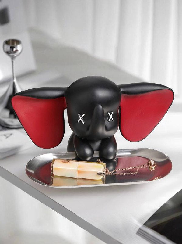 Black elephant figurine with tray