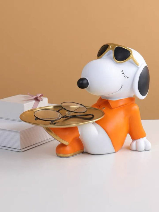 Orange dog figurine with metal tray