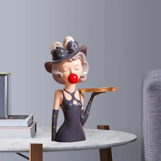 Figurine girl with tray