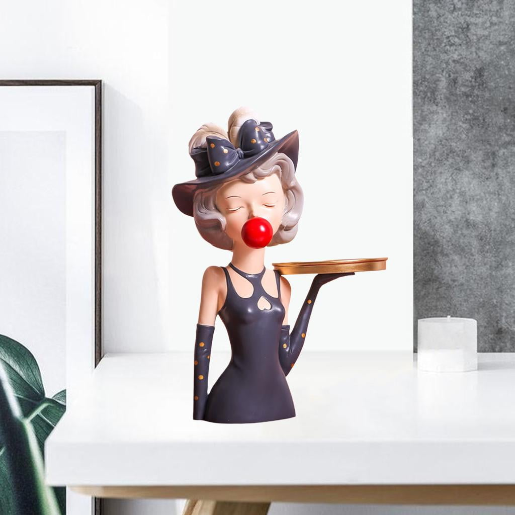 Figurine girl with tray