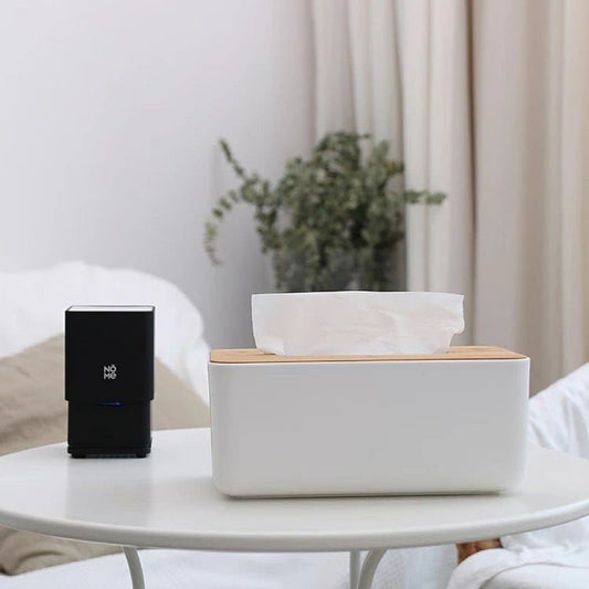 White plastic napkin holder with bamboo lid