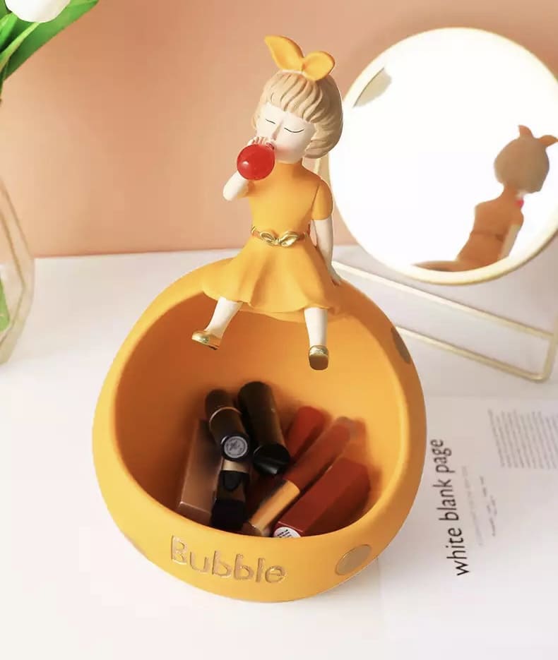 Figurine, phone stand girl with gum orange