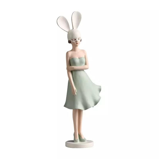 Figurine of a girl with rabbit ears