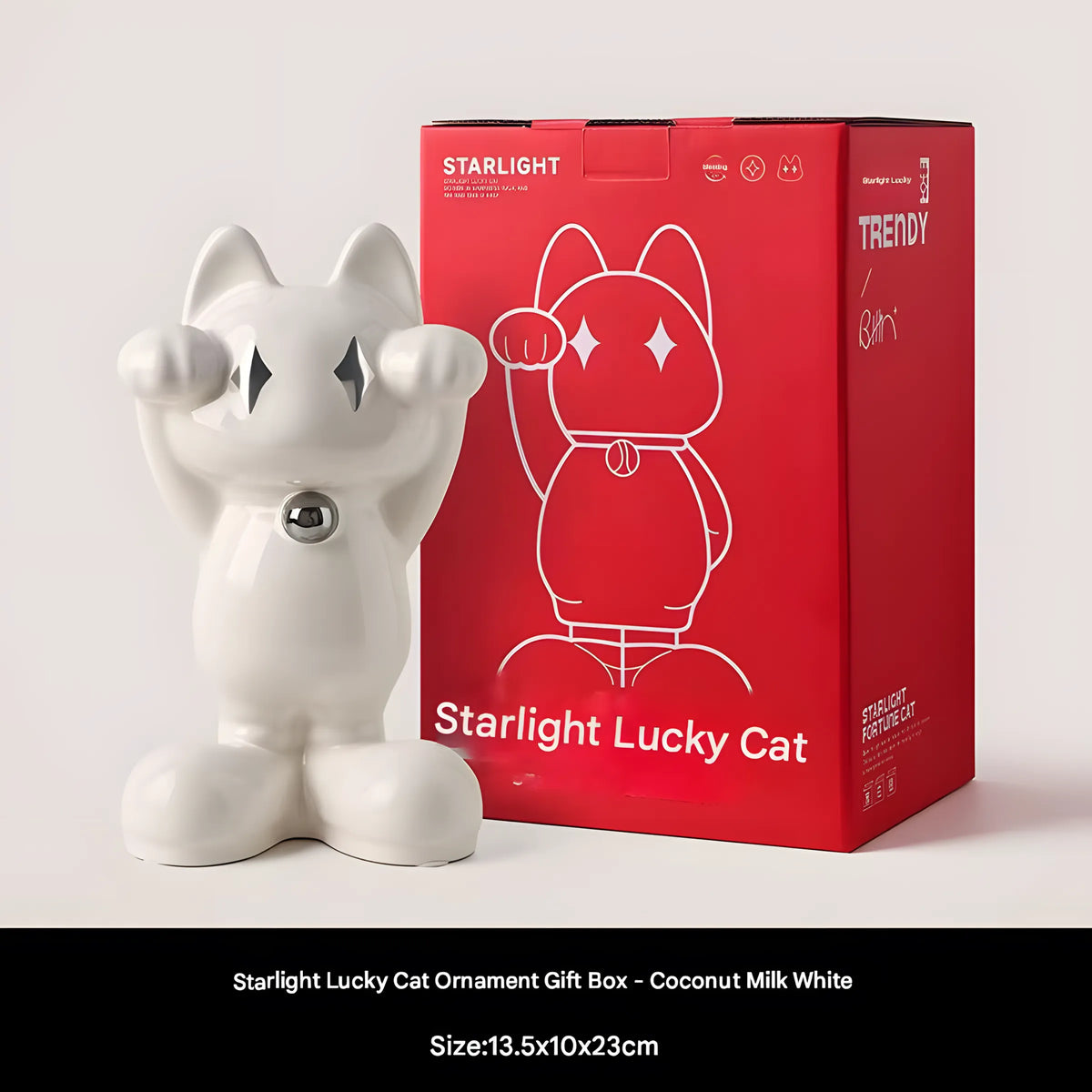 A coconut milk white ceramic Starlight Lucky Cat ornament standing next to its red gift box, with a black text bar at the bottom containing product details.