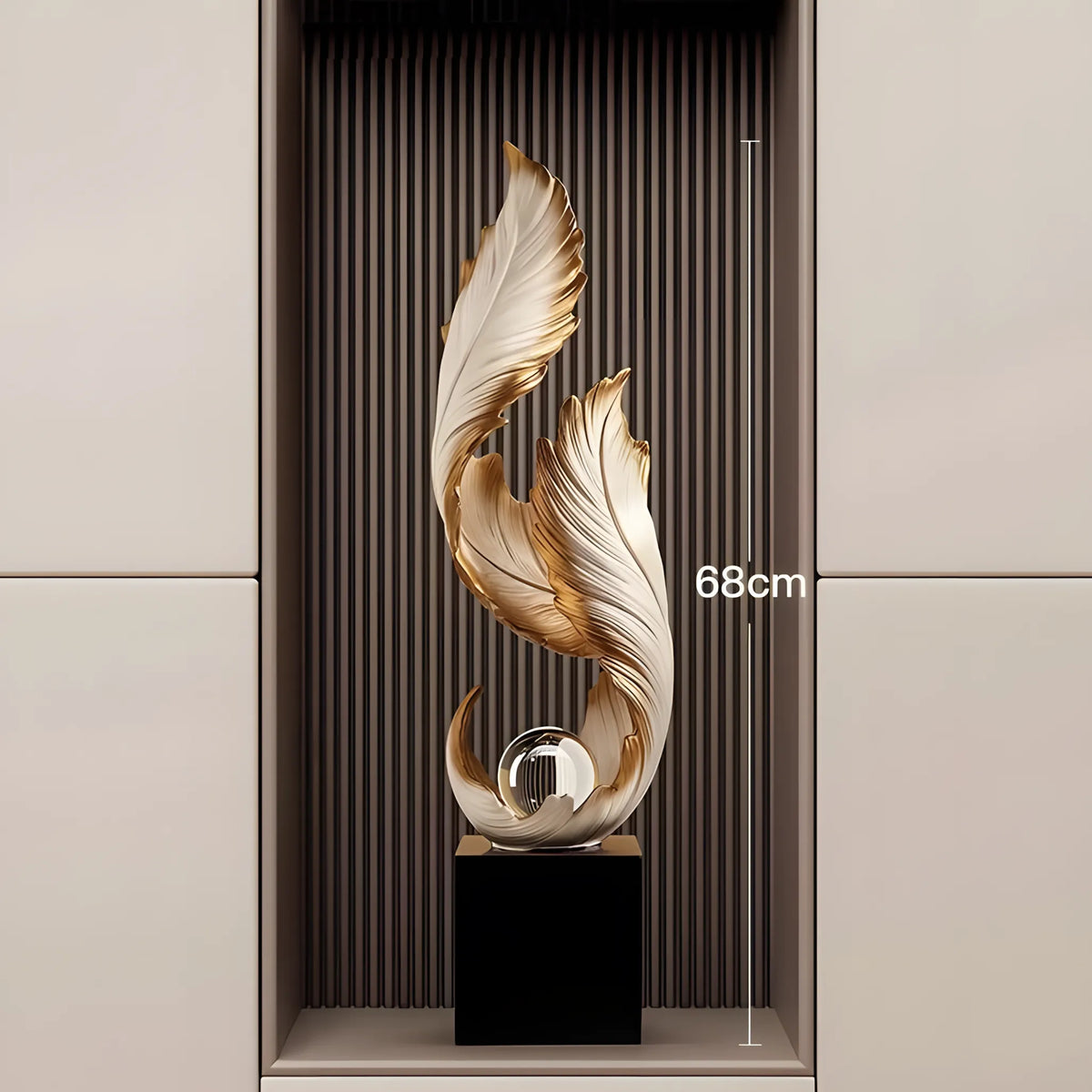 A modern abstract decorative sculpture with flowing metallic gold and cream leaf-like forms on a black pedestal, displayed in a recessed wall niche. A vertical dimension marker reads 68cm.