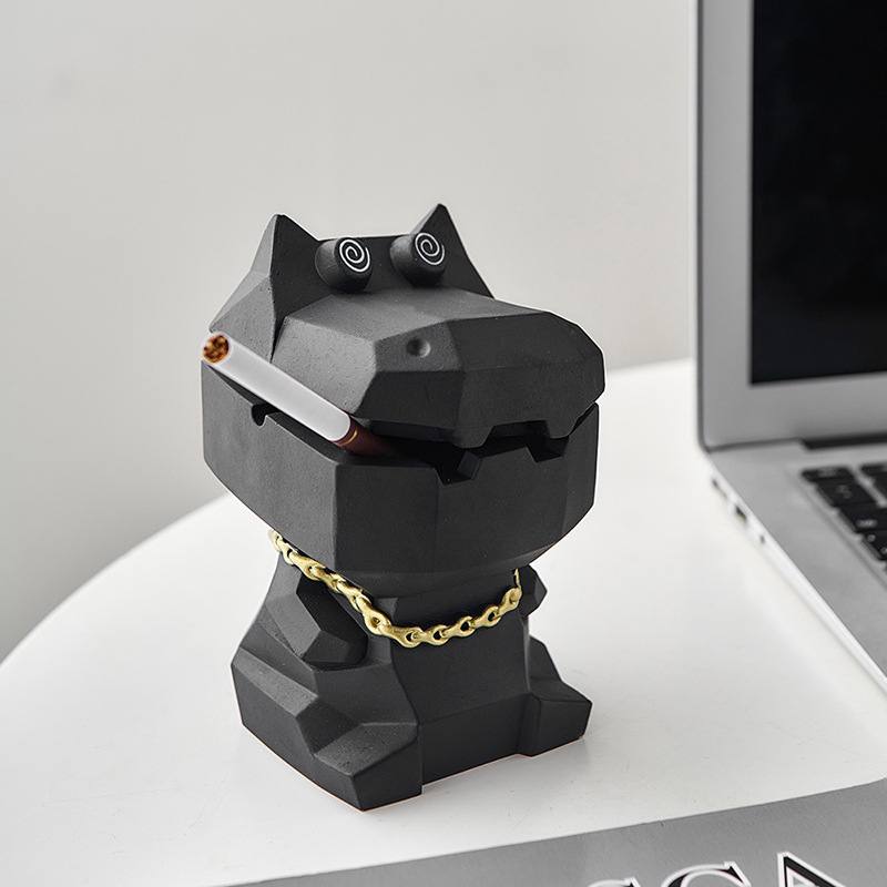 Dinosaur ashtray black. Dinosaur money box