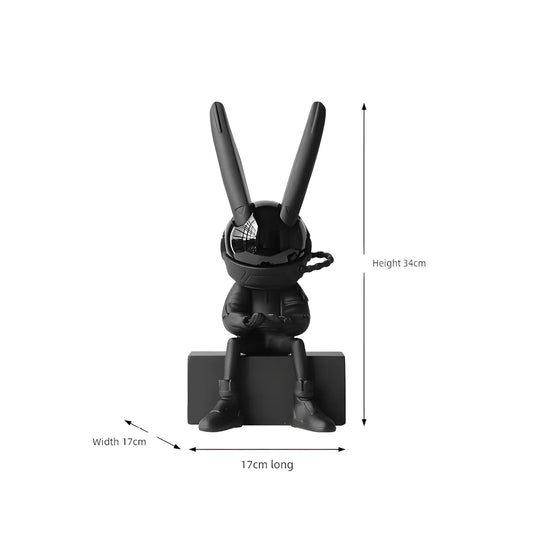 Product dimensions diagram for the sitting astronaut rabbit sculpture indicating 34cm height, 17cm length, and 17cm width