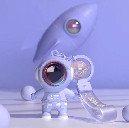Astronaut keychain with flashlight purple