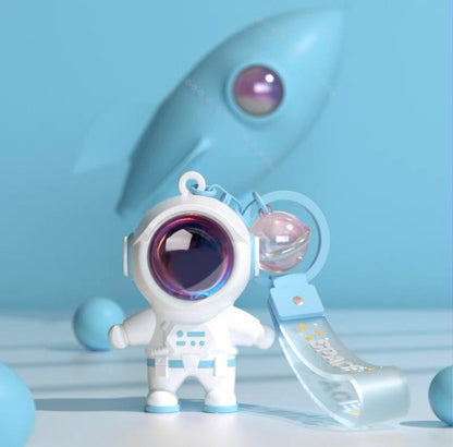 Astronaut keychain with flashlight blue