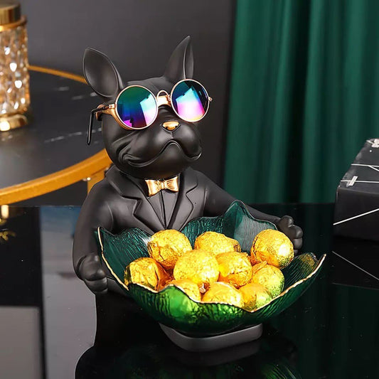 Dog figurine in sunglasses with a fruit plate