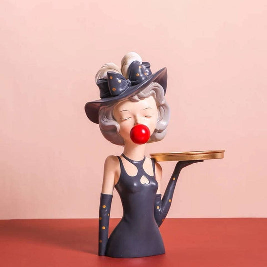 Figurine girl with tray
