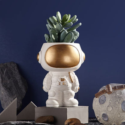 Astronaut figurine, plant pot