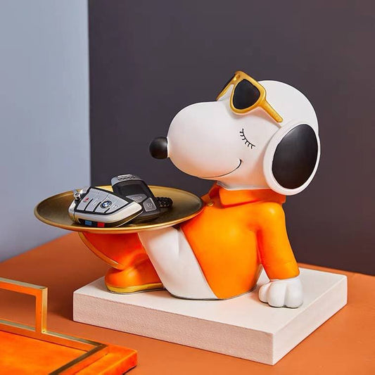 Orange dog figurine with metal tray