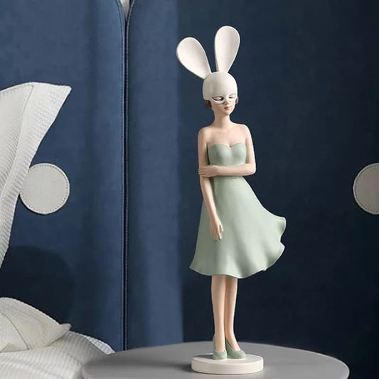 Figurine of a girl with rabbit ears