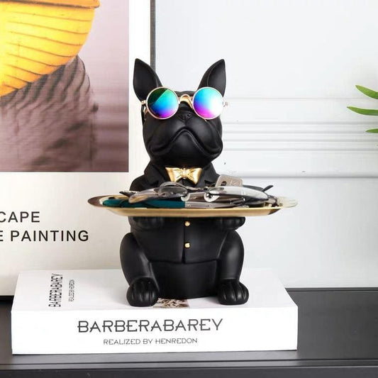Dog figurine in sunglasses with tray