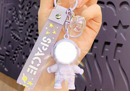 Astronaut keychain with flashlight purple