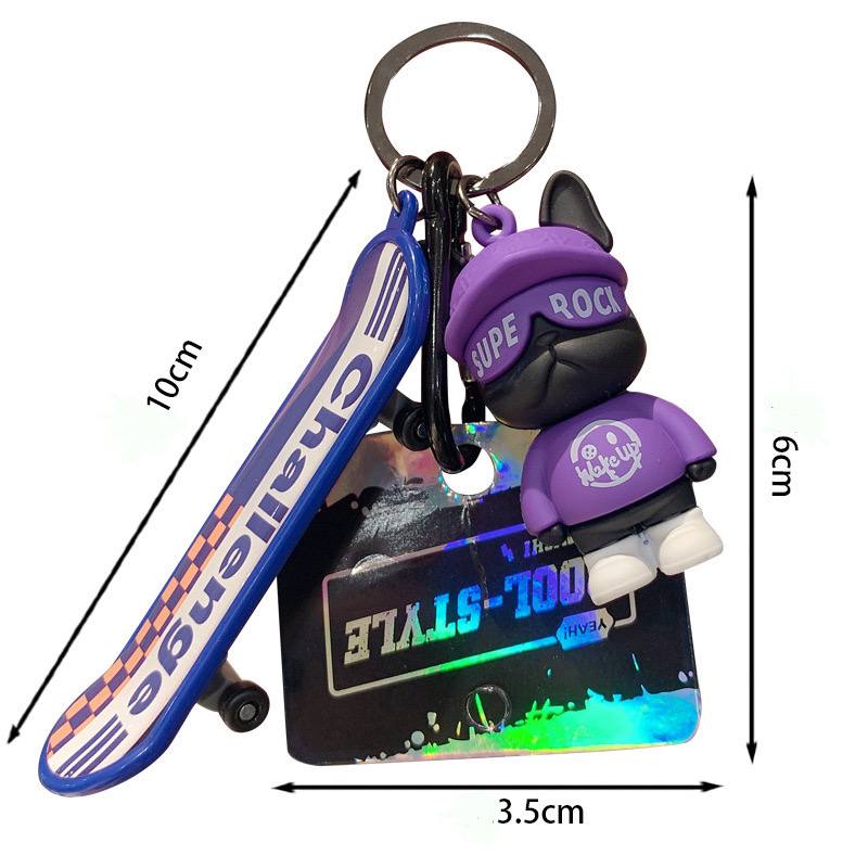 Keychain dog with skateboard purple