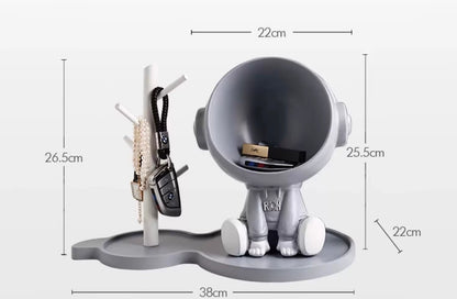 Astronaut figurine with a stand for small items, gray