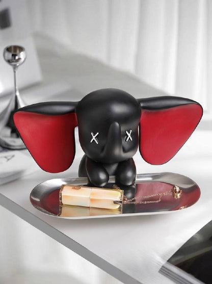Black elephant figurine with tray