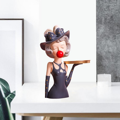 Figurine girl with tray