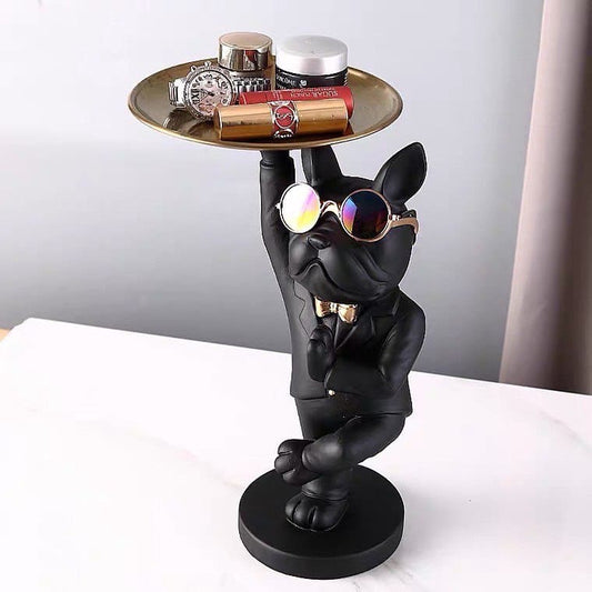 Figurine of a dog in glasses with a plate meditating